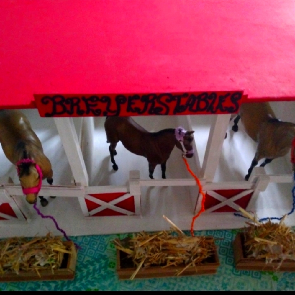 Handcrafted red and white Breyer wooden horse stable